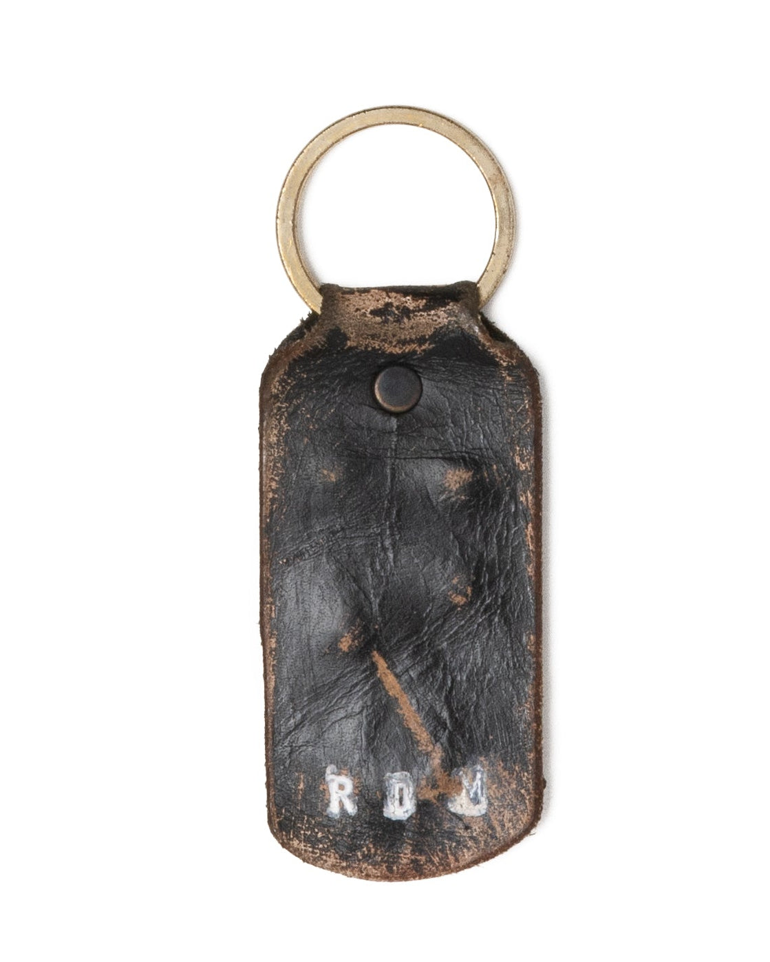 Each keychain tells its own story — cut, aged, and finished by hand in Haven St. by Mr. Fat himself.

Made from full-grain leather that’s been deliberately distressed, the surface bears natural scuffs, patina, and burnished edges that only come from real hands and real work. Every piece is unique — no two wear the same scars.